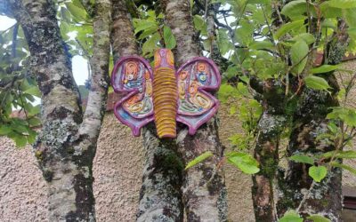 A Butterfly Lights Beside Us